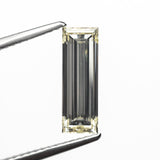 1.52ct 12.21x4.16x2.86mm VS2 O-P Baguette Step Cut 26124-01