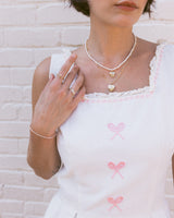 Oval White Pearl Strand