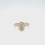 Oval Diamond Partial Bezel Ring