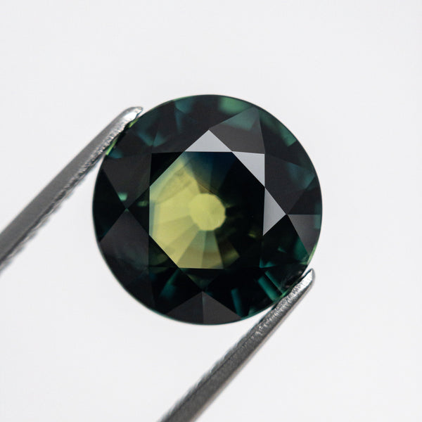 4.87ct 10.51x10.46x5.67mm Round Brilliant Sapphire 21607-02