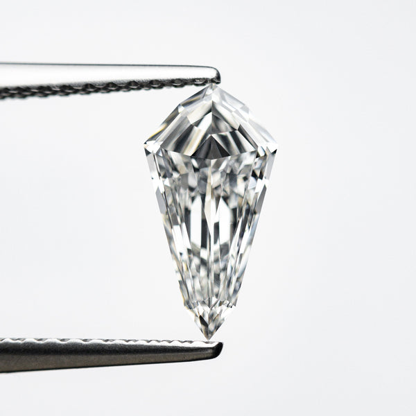 0.71ct 10.00x5.18x2.29mm VS1 F Kite Step Cut 21690-06