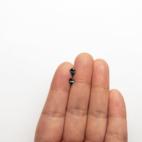 0.90cttw 2pc 6.70x4.11x2.64mm 6.65x4.15x2.72mm Geo Pear Step Cut Sapphire Matching Pair 22768-13