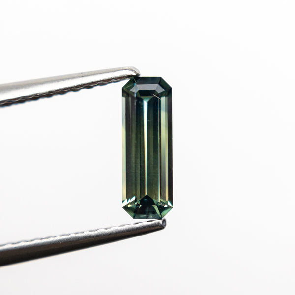 0.66ct 8.62x3.04x2.27mm Cut Corner Rectangle Step Cut Sapphire 23090-01