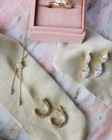 Marquise Hidden Halo Studs