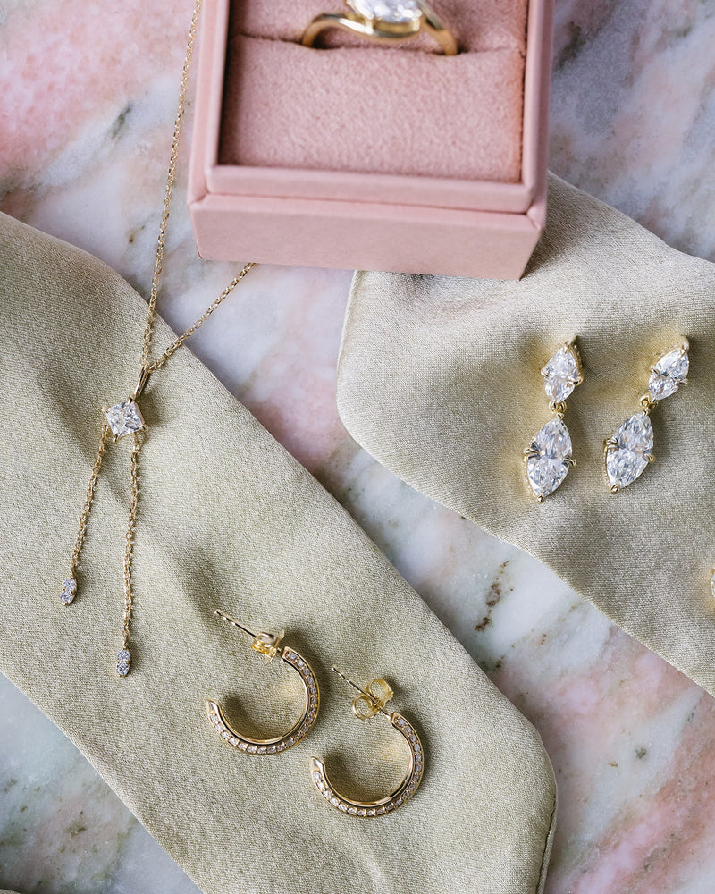 Marquise Hidden Halo Studs